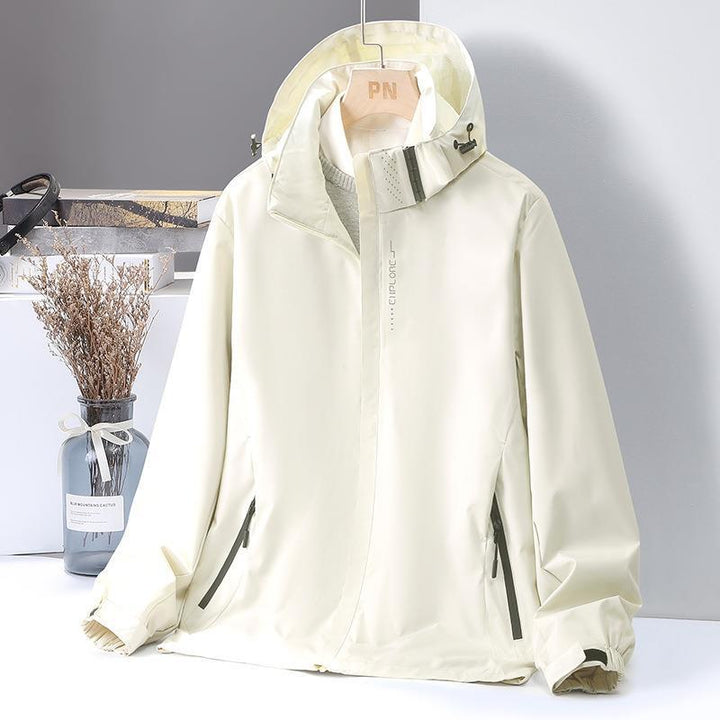 Damen Leichte Softshell-Kapuzenjacke mit winddichter Sturmleiste und verdeckten Reißverschlusstaschen – Célinea