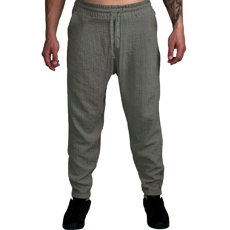 Herren Texturierte tapered Jogginghose mit Elastikbund, Tunnelzug & gerippten Knöchelbündchen – Sorevano