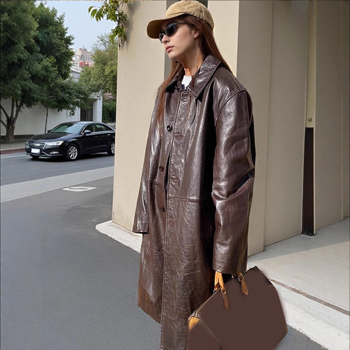 Damen langer Lederimitatmantel mit doppelreihiger Knopfleiste und Oversize-Schnitt Echoarchiv