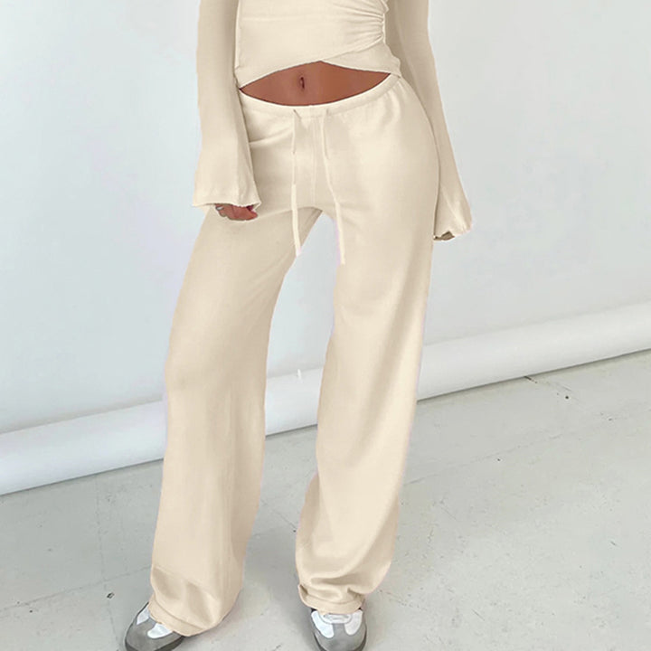 Damen nan Wickel-Cropped-Top mit tiefem V‑Ausschnitt, taillierter Wickelform und langen Glockenärmeln Echo Archiv