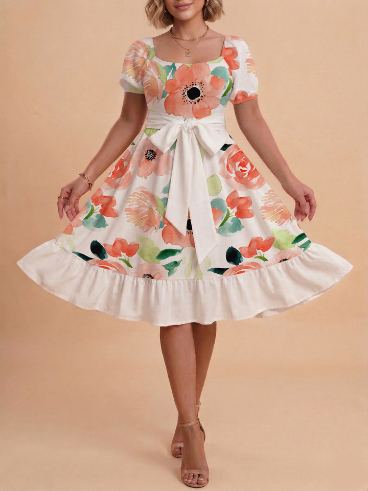 Damen Sommerliches Blumenkleid mit taillierbarem Gürtel und voluminösen Ärmeln Echo Archiv