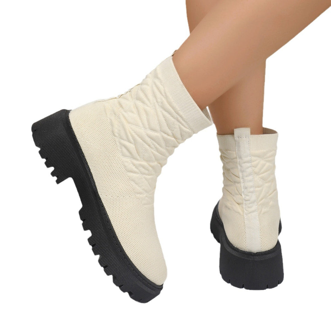 Damen Strick-Sockenboots mit geometrischer Stepp-Optik und klobiger Lug-Sohle Echoarchiv