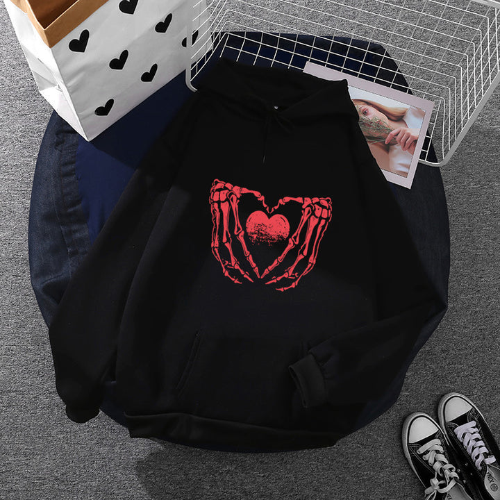 Damen stylischer Kapuzenpullover mit Skeletthand Herzmotiv und Kängurutasche – Auréline