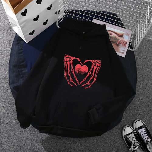 Damen stylischer Kapuzenpullover mit Skeletthand Herzmotiv und Kängurutasche – Auréline