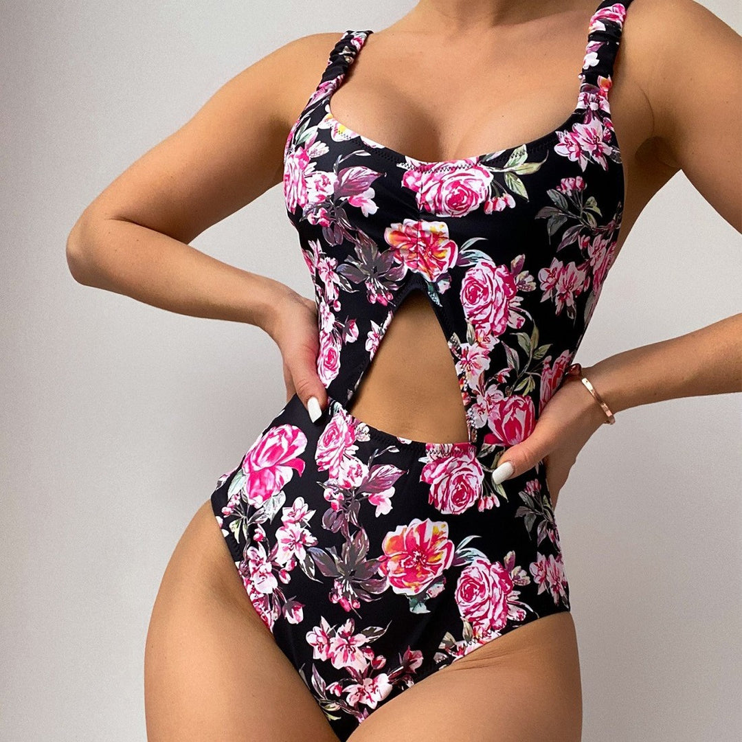 Damen Badeanzug mit floralem Design und ausgefallenem Ausschnitt Echo Archiv
