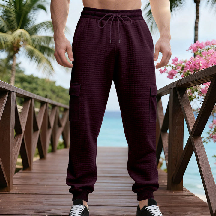 Herren Texturierte Cargo-Jogginghose mit Tunnelzug, aufgesetzten Klappentaschen und gerippten Bündchen – Bravaro