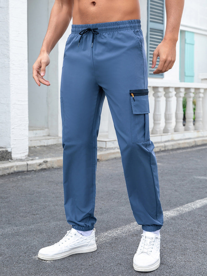 Herren Tech-Cargo-Jogginghose mit elastischem Tunnelzug, Reißverschluss‑Beintasche & eng anliegendem Fußbündchen Echo Archiv
