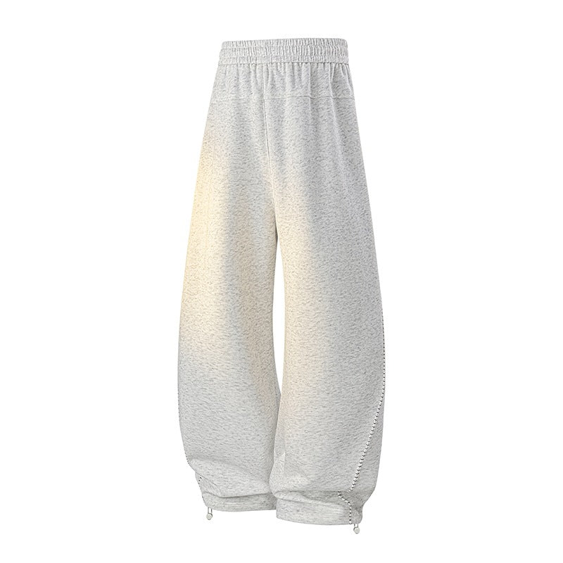 Herren Oversize-Baggy-Jogginghose mit Tunnelzug, seitlicher Druckknopfleiste & verstellbaren Beinabschlüssen Echoarchiv