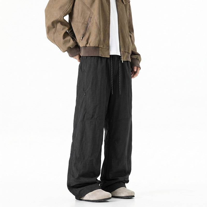 Herren Weite Baggy‑Hose mit Tunnelzugbund und Paneel‑Konstruktion Echo Archiv