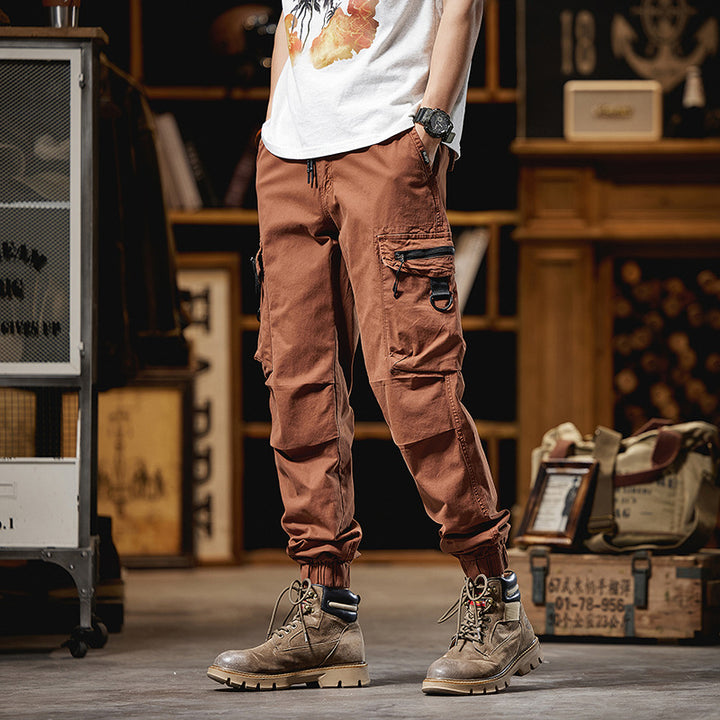 Herren Multifunktionale Cargo-Jogginghose mit D-Ringen, Reißverschluss‑Klappen und elastischen Bündchen Echo Archiv