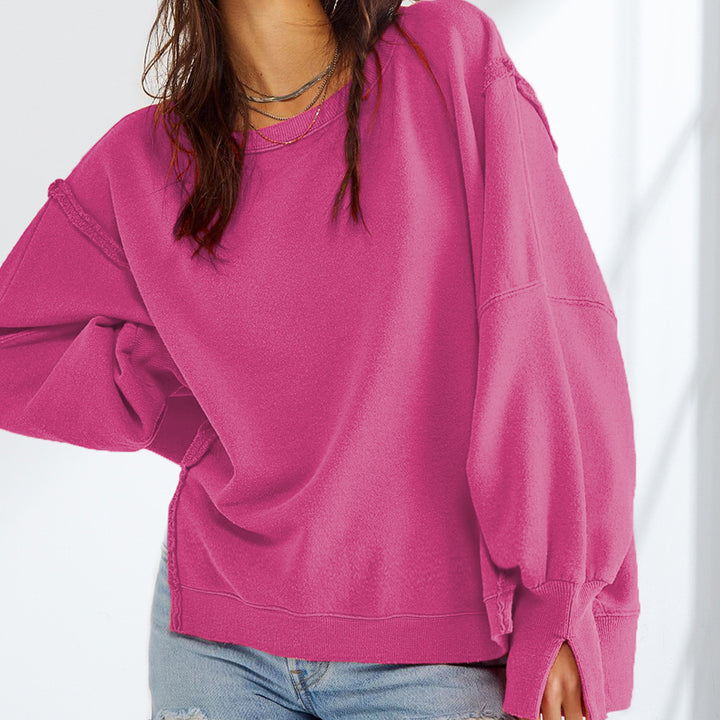Damen Oversized Sweatshirt mit Ballonärmeln, seitlichen Schlitzen und offenen Kanten Echoarchiv