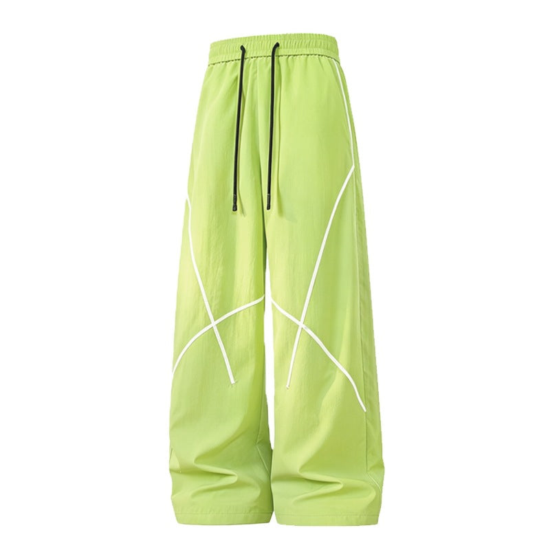 Herren Weite Funktions-Nylonhose mit Kordelbund, reflektierenden Nahtdetails & lässiger Baggy‑Silhouette Echoarchiv