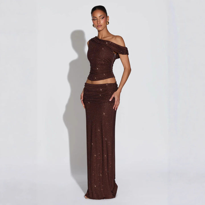 Damen Glänzendes Oberteil mit asymmetrischem Schnitt und glamourösen Strassdetails Echo Archiv