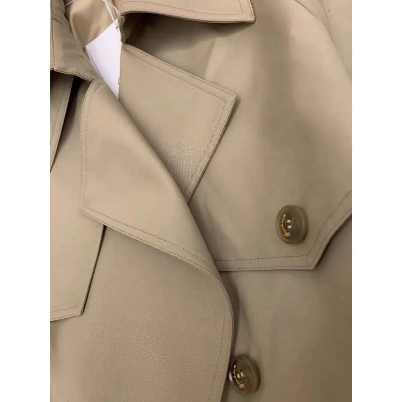 Damen Eleganter Midi-Trenchcoat mit Oversize-Schulterklappe, gerafften Ärmeln und taillierendem Bindegürtel Echoarchiv