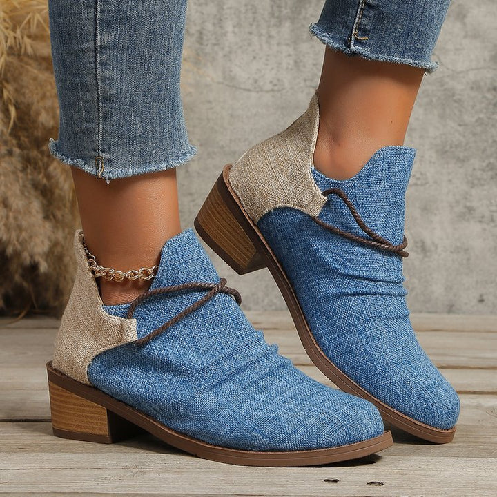 Damen Kurzstiefelette mit Leoparden-Print, Canvas-Obermaterial, dekorativem Flechtriemen und niedrigem Blockabsatz Echo Archiv