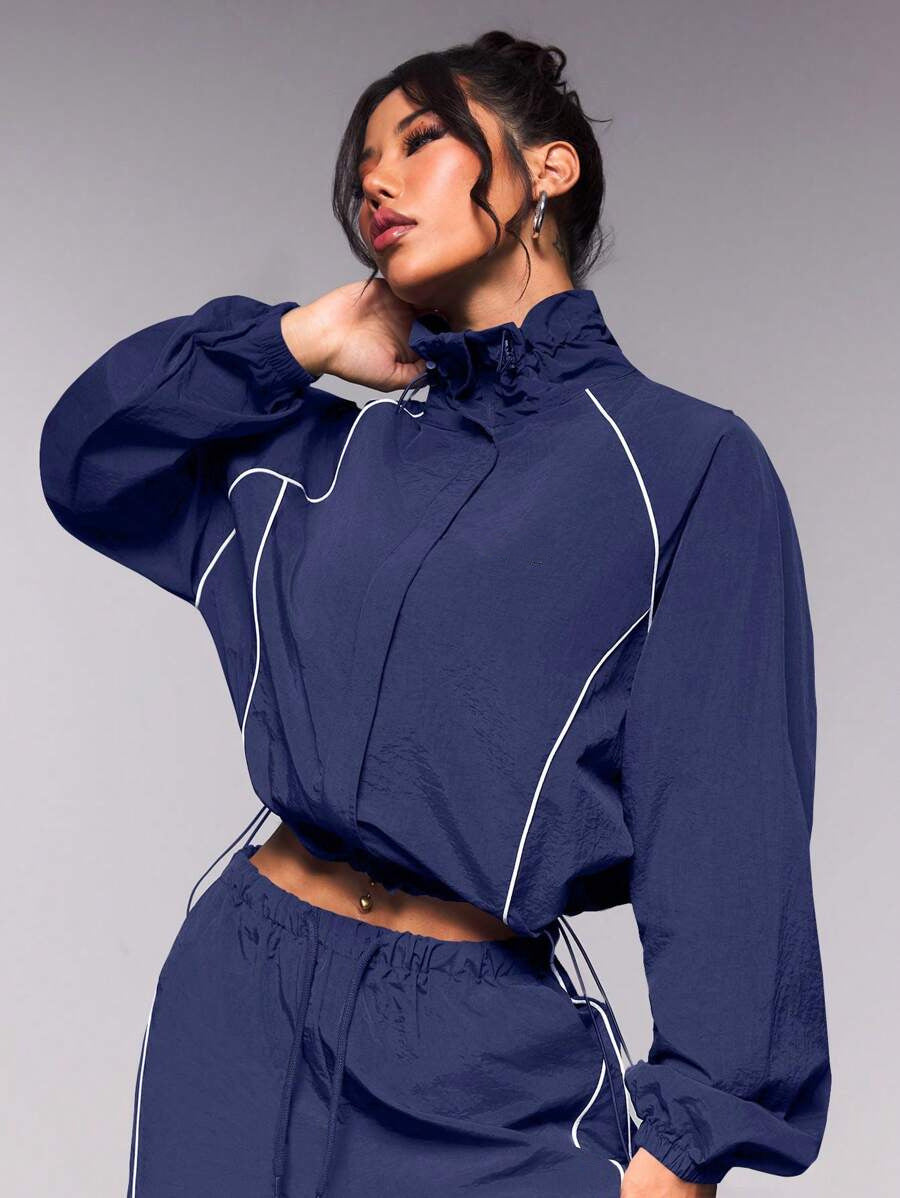 Damen sportives Cropped Windbreaker-Set mit Stehkragen Tunnelzug und reflektierenden Paspeln – Avérine