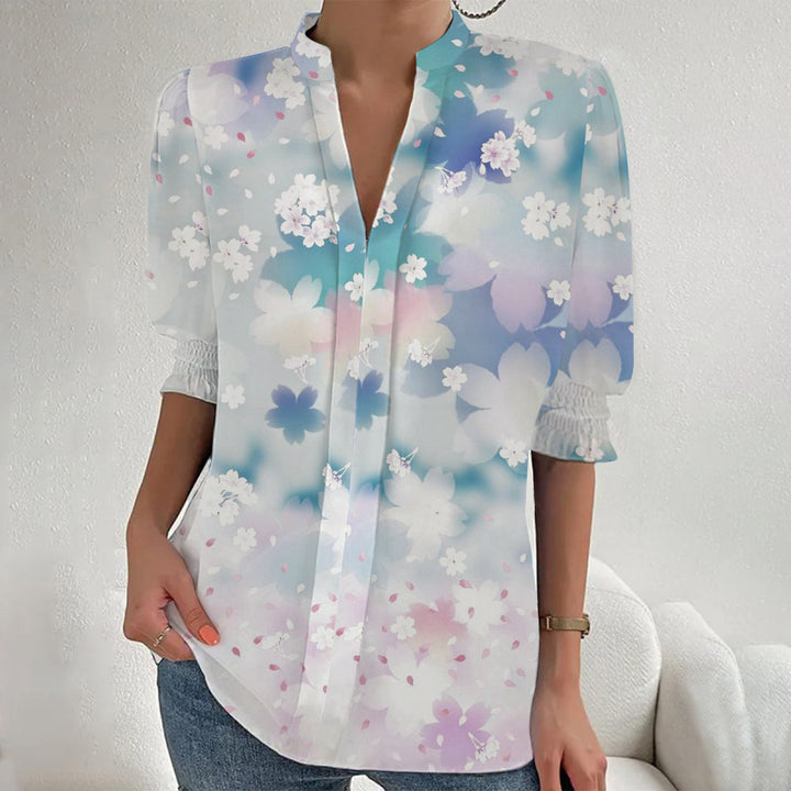 Damen Blumenprint Tunika-Bluse mit Stehkragen, geschlitzter V‑Blende und gerafften 3/4-Ärmeln – Élovi