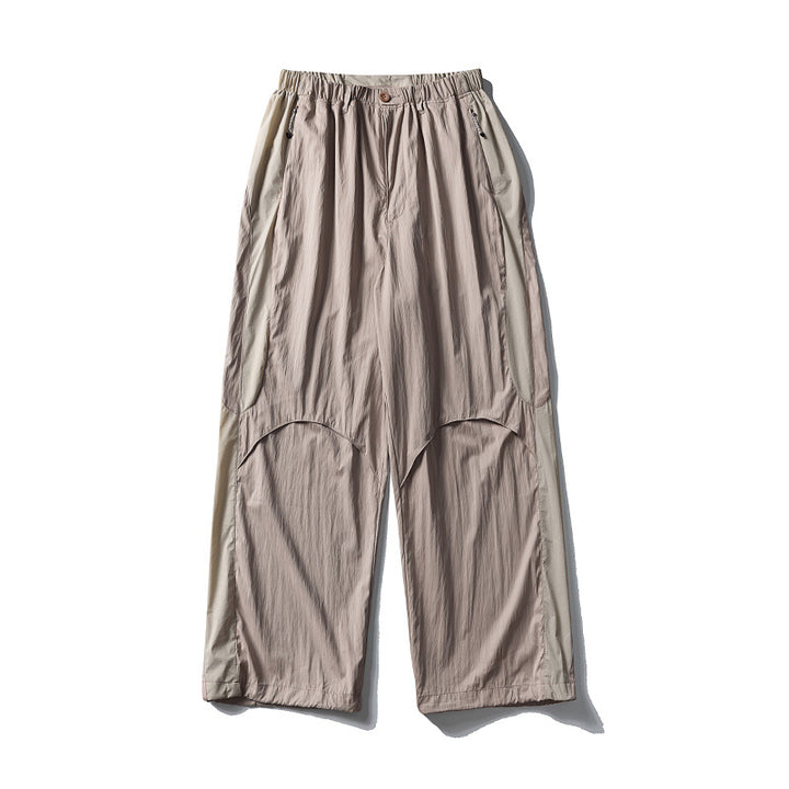 Herren Weite technische Nylon-Cargohose mit elastischem Bund und Paneel-Details Echoarchiv