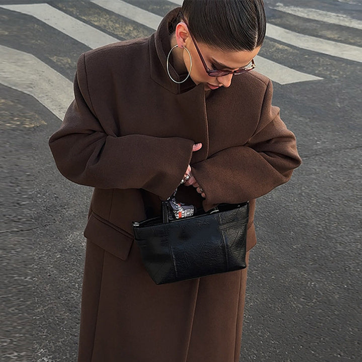 Damen Maxilanger Wollmix-Mantel mit kastiger Oversize‑Silhouette und markanten Schultern Echoarchiv