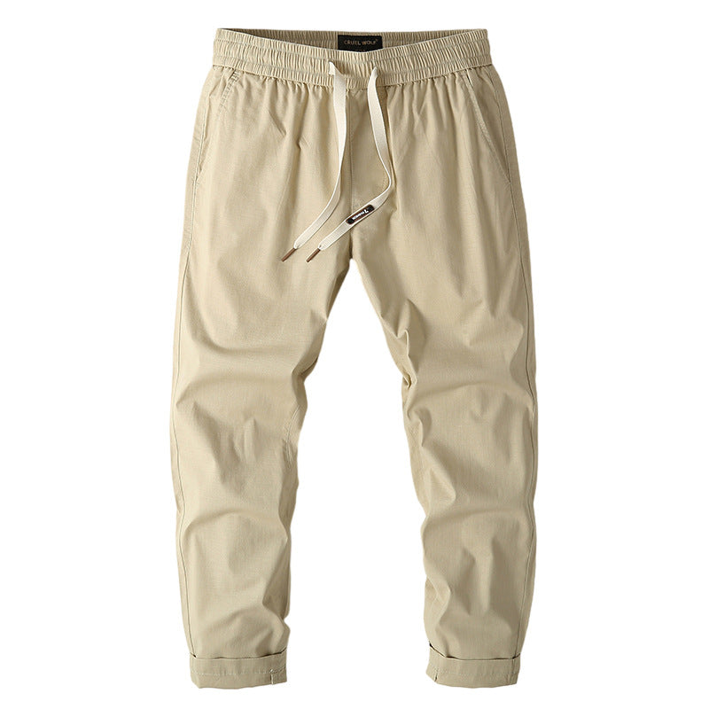 Herren Elastische Chino-Jogger mit tailliertem Tapered-Schnitt und aufgesetzter Gesäßtasche Echoarchiv