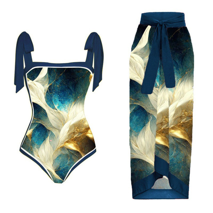 Damen Einteiler Badeanzug mit elegantem Wickelrock und modischen Riemen Echo Archiv