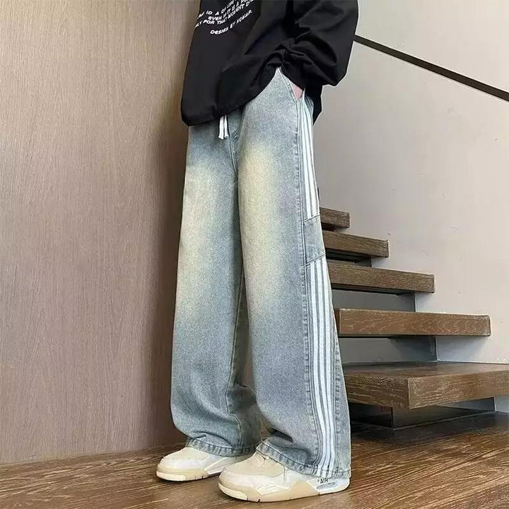 Herren weit geschnittene Denim-Hose mit seitlichen Streifen und Taschen Echoarchiv
