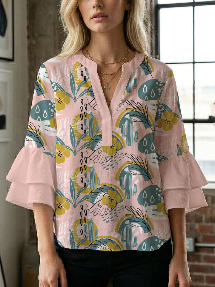 Damen Blusenshirt mit voluminösen Ärmeln und kreativem Druckdesign Echo Archiv