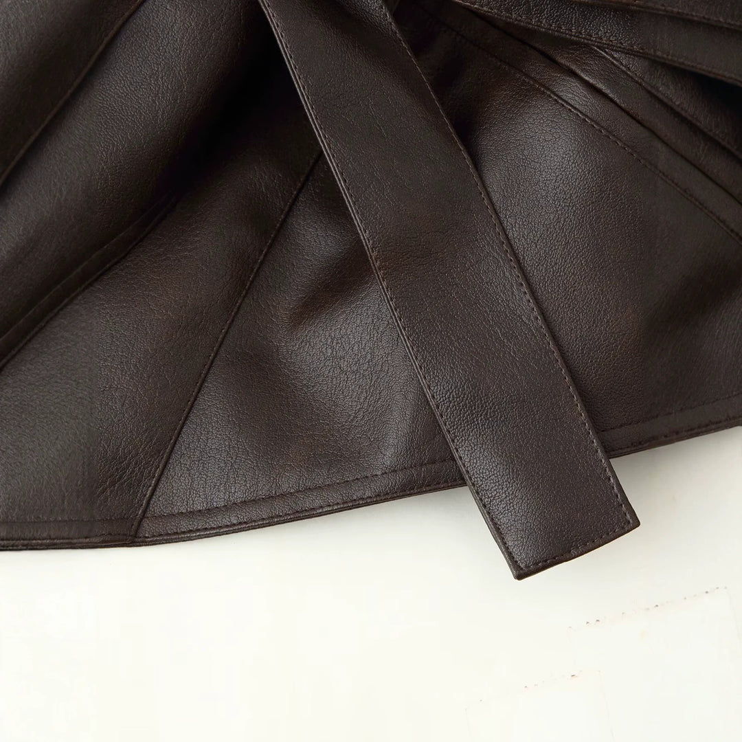 Damen Kurzjacke aus Lederimitat mit langen Kunstfellärmeln und Bindegürtel Echoarchiv