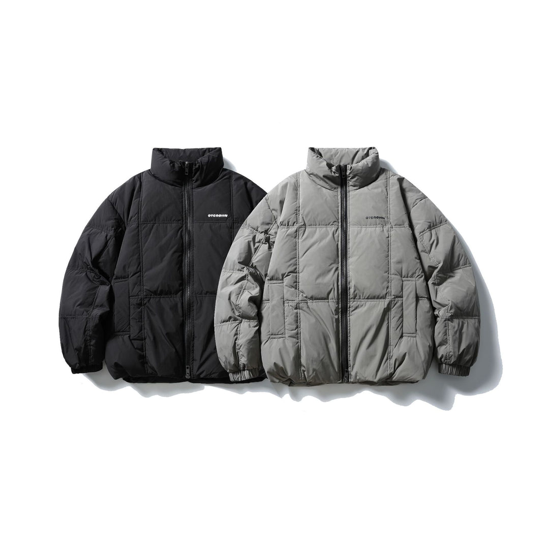 Herren Boxy-Steppjacke mit hohem Standkragen, Karo-Steppung und elastischem Saum Echoarchiv