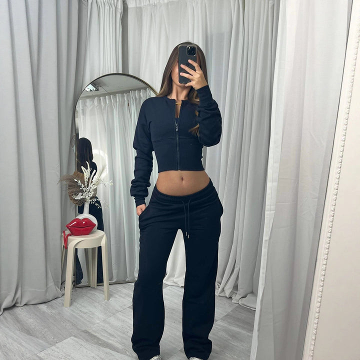 Damen nan kurzes Zip-Cropped-Shirt mit formendem Bund und breite Relax-Sweatpants mit Tunnelzug Echo Archiv