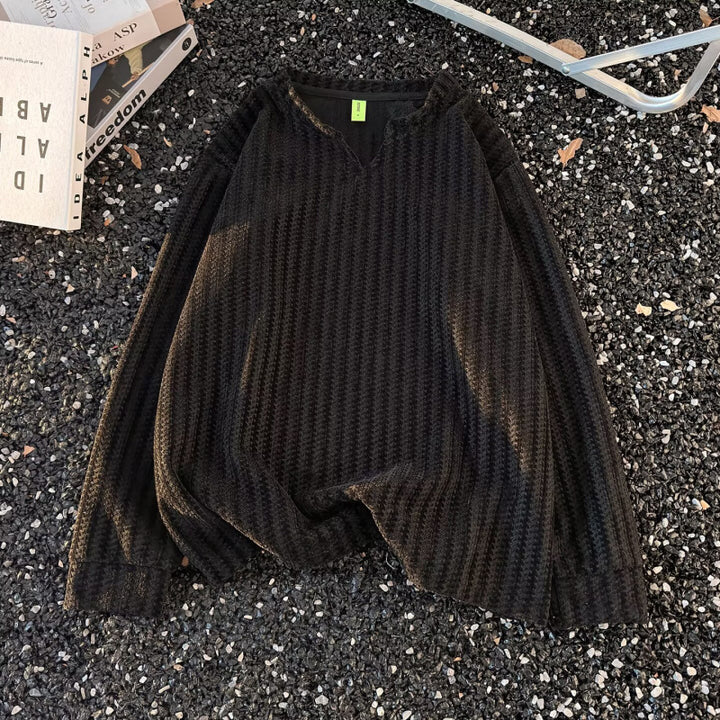 Damen Feinstrick-Pullover mit feiner Waffelstruktur, V-Notch-Ausschnitt und legerer Oversize-Passform Echoarchiv
