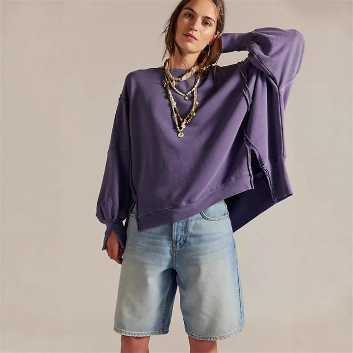 Damen oversized Sweatshirt mit Ballonärmeln, offenen Saumnähten und seitlichen Schlitzen – Avérine