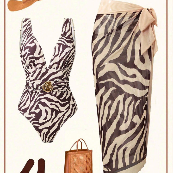 Damen Eleganter Strandmode-Anzug mit tiefem V-Ausschnitt und Gürtel Echo Archiv