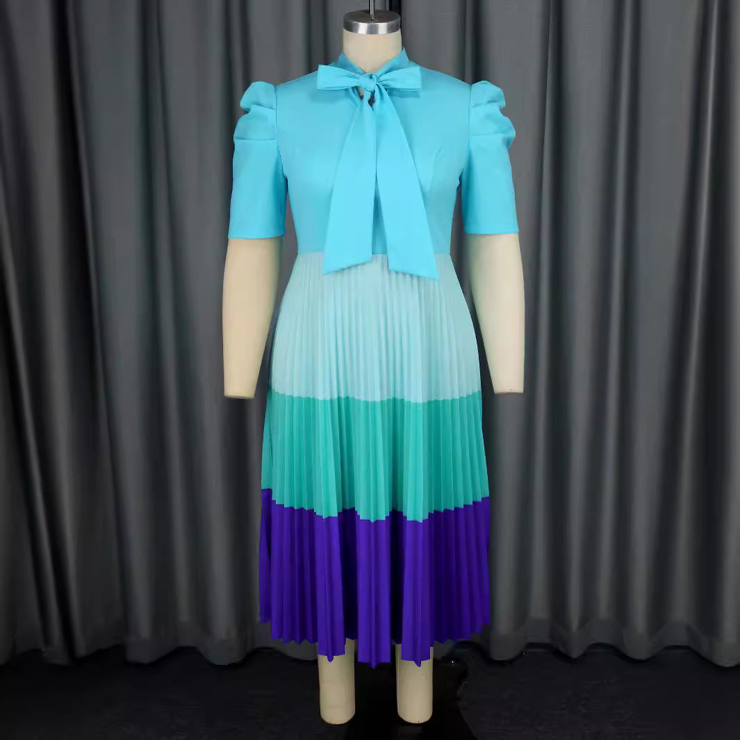 Damen Elegantes Plisseekleid mit Schleifenkragen Echo Archiv