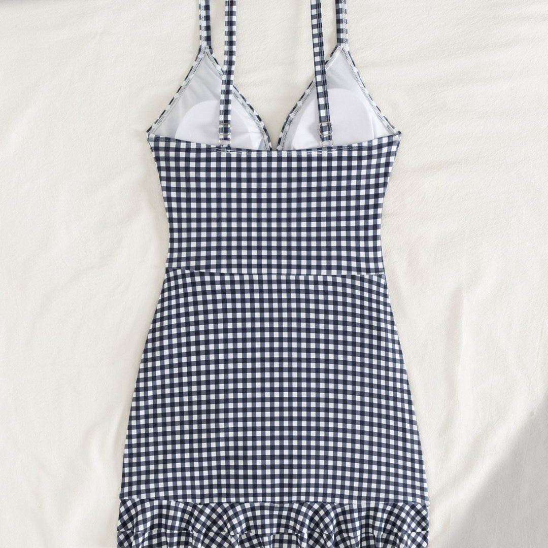 Damen Strandkleid mit modischen Raffungselementen und femininem V-Ausschnitt Echo Archiv
