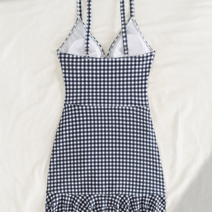 Damen Strandkleid mit modischen Raffungselementen und femininem V-Ausschnitt Echo Archiv