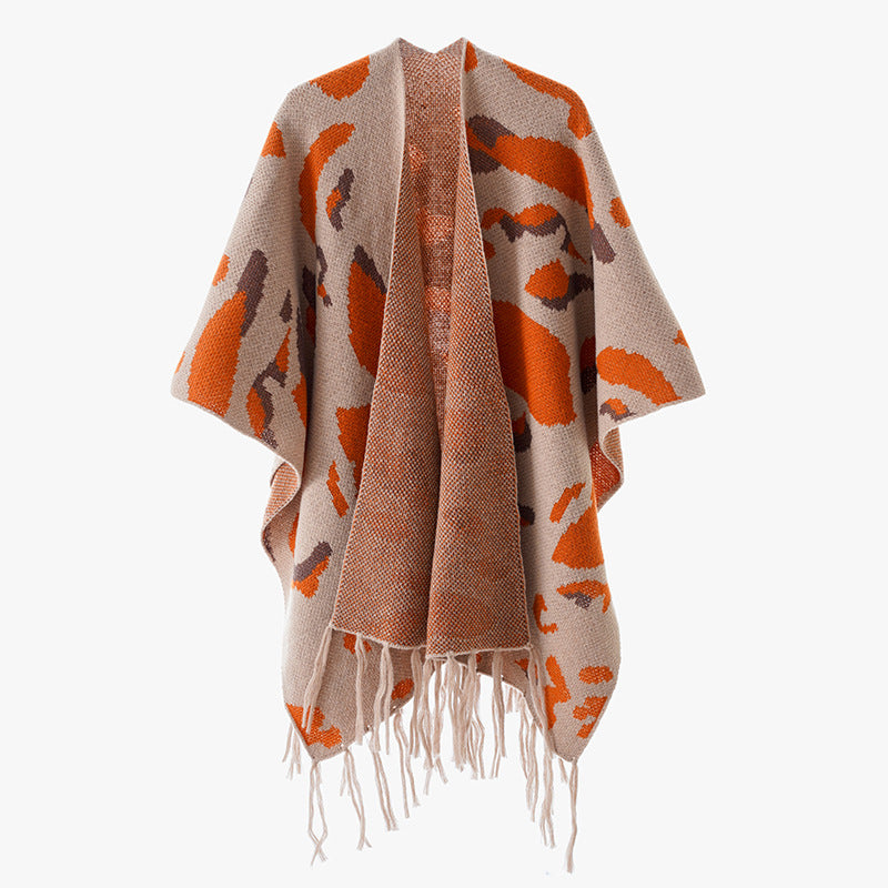 Damen Oversize-Strickponcho mit animalischem Jacquard und Fransensaum Echo Archiv