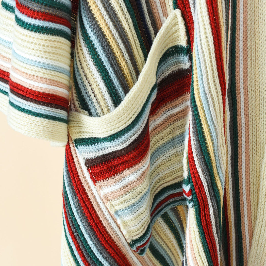 Damen Gestreifter Strickponcho mit Fransen und Eingrifftaschen Echo Archiv