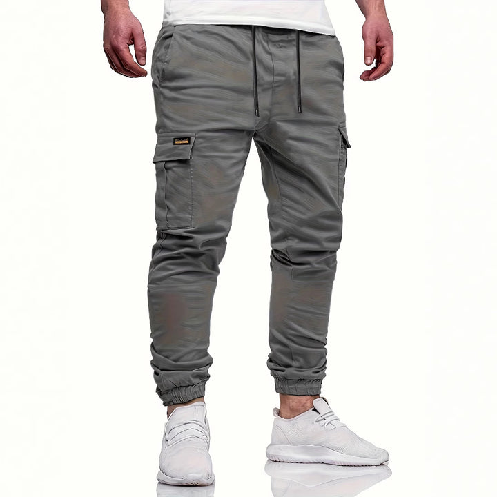 Herren Slim‑Tapered Utility‑Cargohose im Joggerstil mit Klapp- und Reißverschlusstaschen Echo Archiv