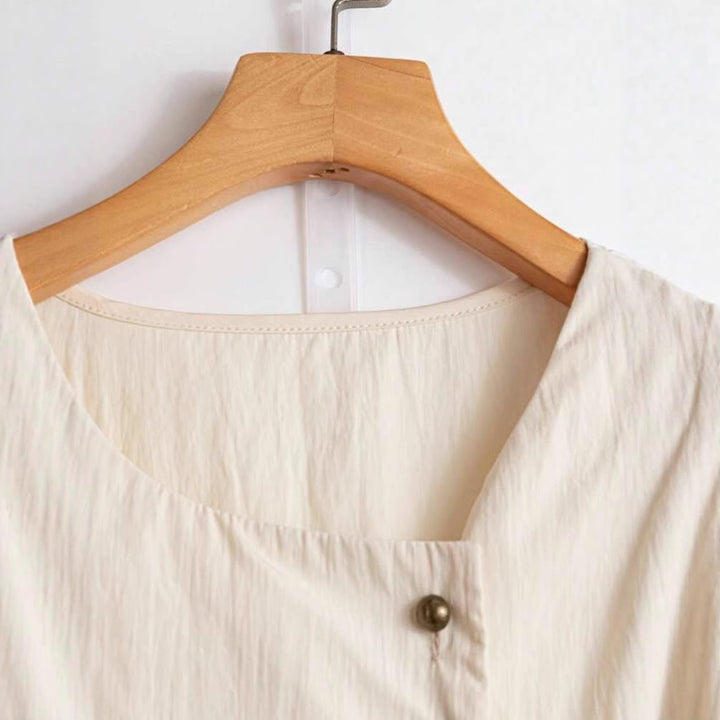 Damen Elegantes Wickeloberteil mit Knopf- und Schleifendetails Echo Archiv