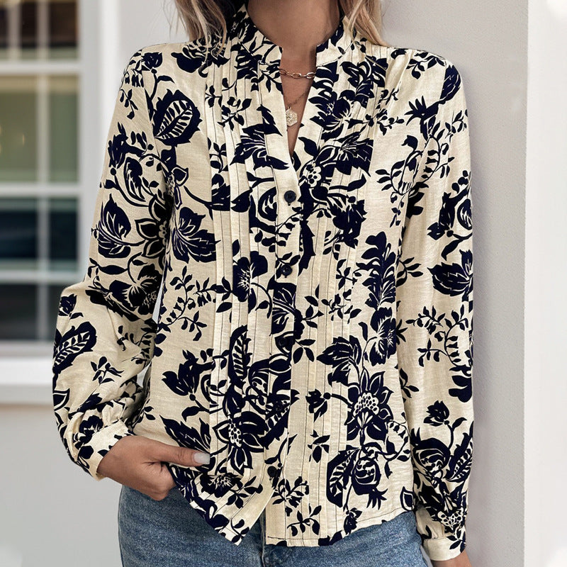 Damen Locker geschnittene Bluse mit Stehkragen, Kellerfalten und floralem Print – Élovi