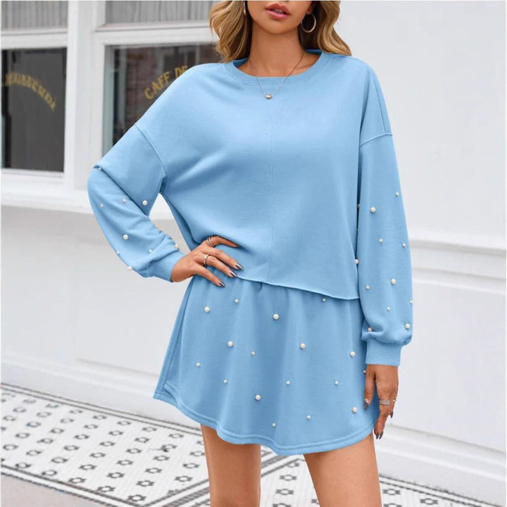Damen nan perlenbesetztes Sweat-Set mit überschnittenem Pullover und ausgestelltem Minirock Echo Archiv