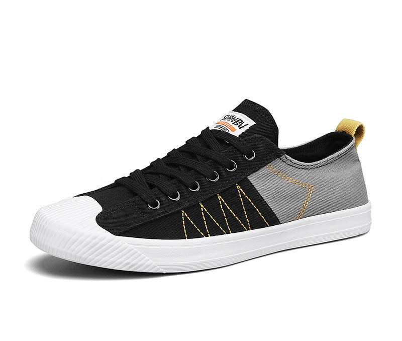 Unisex niedrige Canvas-Sneaker mit verstärkter Gummi-Zehenkappe und kontrastierenden Textilpaneelen – Norré
