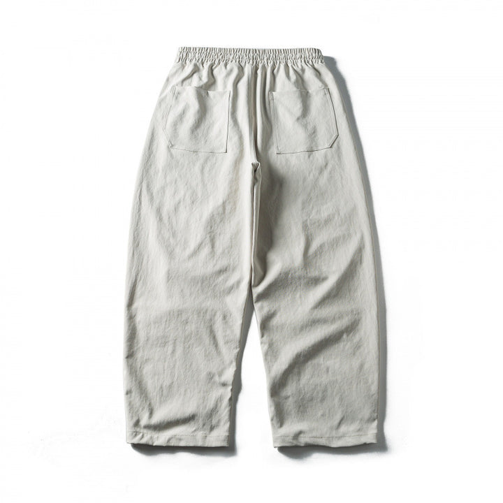 Unisex Weite Cropped-Hose mit Tunnelzug, elastischem Bund und markanten Nahtpaneelen Echo Archiv