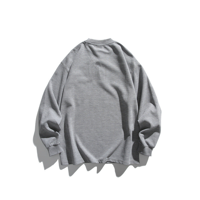 Unisex Oversize Waffel-Henley mit Raglanärmeln und Brusttasche Echoarchiv