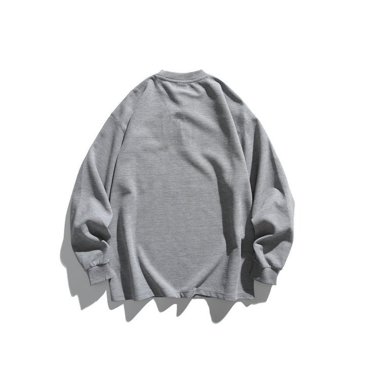 Unisex Oversize Waffel-Henley mit Raglanärmeln und Brusttasche Echoarchiv