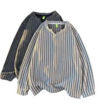 Damen Feinstrick-Pullover mit feiner Waffelstruktur, V-Notch-Ausschnitt und legerer Oversize-Passform Echoarchiv