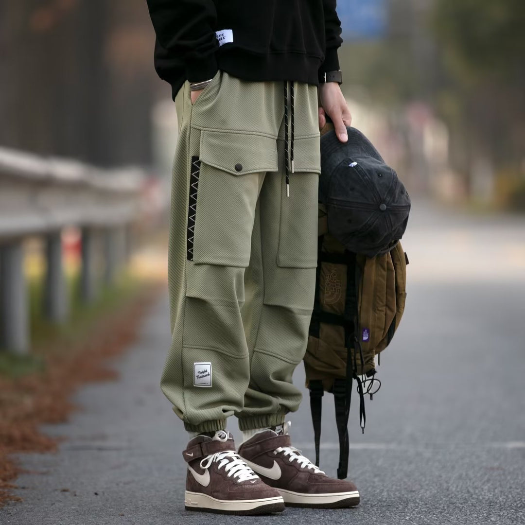 Herren weite Cargo-Jogginghose mit Kordelzug Klapptaschen und elastischen Bündchen Echoarchiv