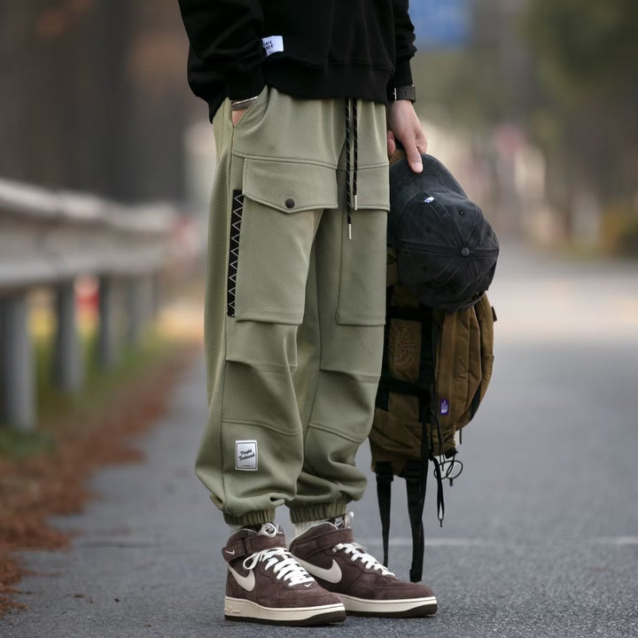 Herren weite Cargo-Jogginghose mit Kordelzug Klapptaschen und elastischen Bündchen Echoarchiv