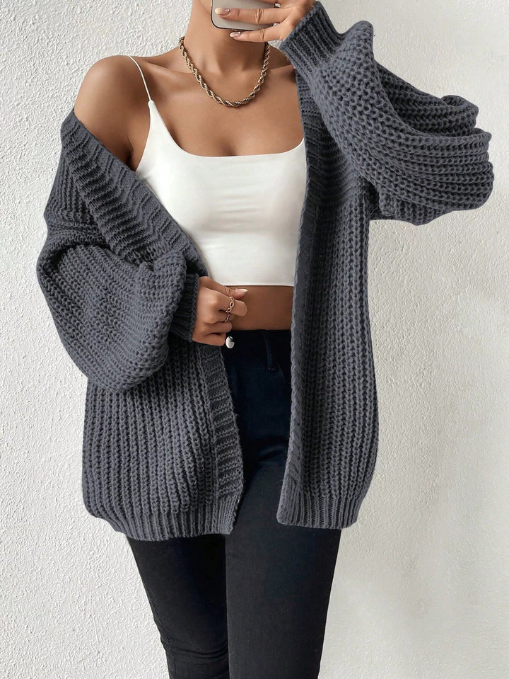 Damen Oversize-Strickcardigan mit grobem Waffelstrick, offener Front und voluminösen Ballonärmeln – Veloura